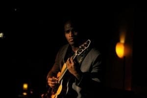 Joel Cross with his Benedetto Bravo jazz guitar