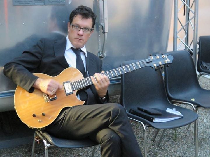 Benedetto Player Dan Faehnle of famed PINK MARTINI, Chambery France with his Benny jazz guitar, 2014