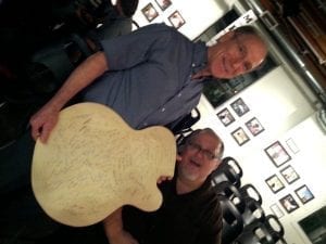 Larry Camp signs Benedetto Guitar back with Bob Benedetto in St Pete FL 9-19-14 photo by drummer Walt Hubbard