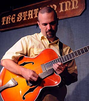 Benedetto Player Tim May with his Americana Custom Autumnburst S1764 with floating pickup, x-brace & tailpiece inlay.