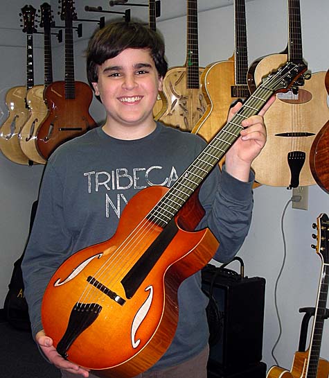 Andy Paul, the namesake of the Andy model, with Andy Elite shown in Autumnburst. (Courtesy Benedetto Guitars)