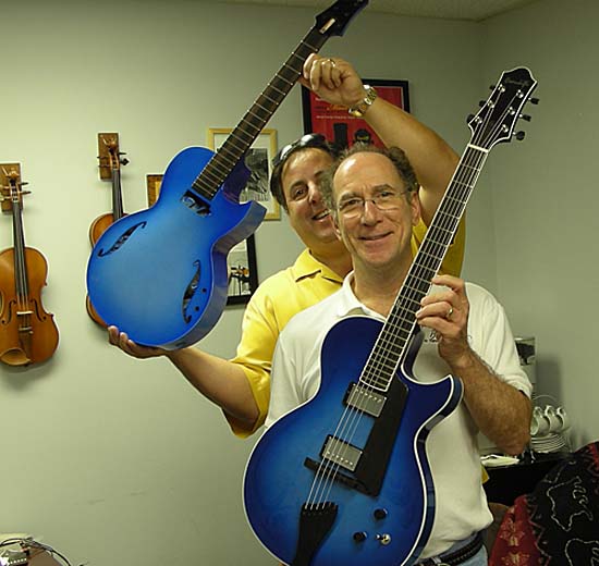 Howard Paul and Bob Benedetto with custom Benedettos for Dr. Jack Harris, June 2009 (Blue Andy and Bambino S1708) (Courtesy Benedetto Guitars)