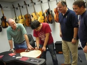 Andreas Varady Signs Benedetto Jazz Gtr Backs 9-27-12 while Bob Benedetto,  Howard Paul and Vintner Dave Miner look on