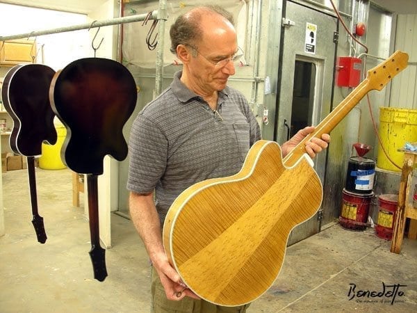 Bob Benedetto inspects a custom 16-B archtop in Finishing at our shop, Savannah, GA, 7-28-13. (Courtesy Benedetto Guitars)