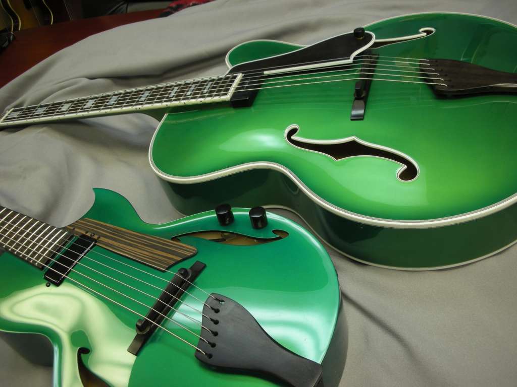 Andy and Fratello models in Emerald Green. (Courtesy Benedetto Guitars)