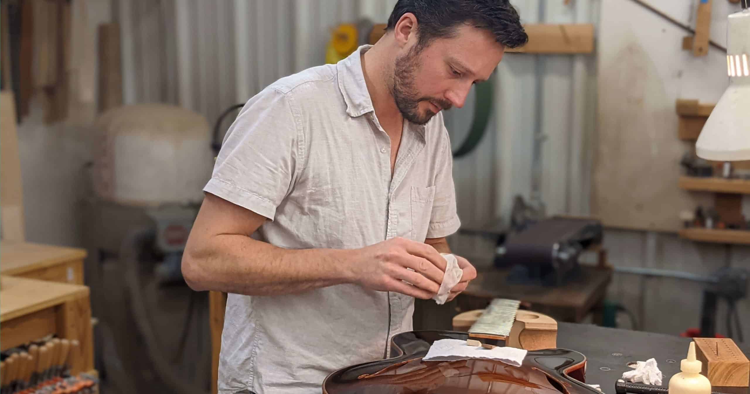 Master Luthier Damon Maitland working at bench