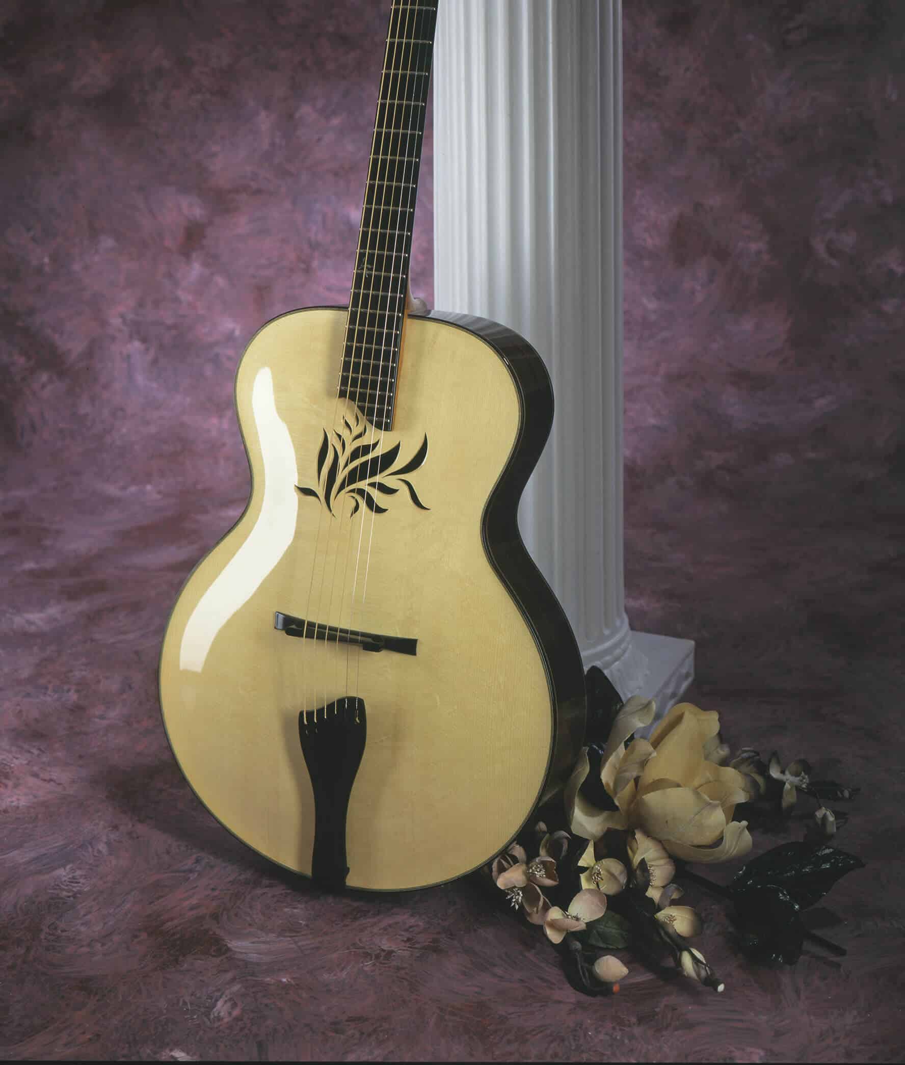 Benedetto Guitar in front of column and purple background