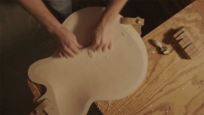Carving Benedetto guitar top.