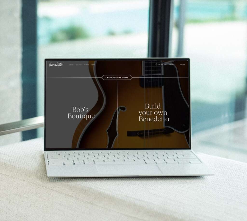 Benedetto Guitars website on laptop screen