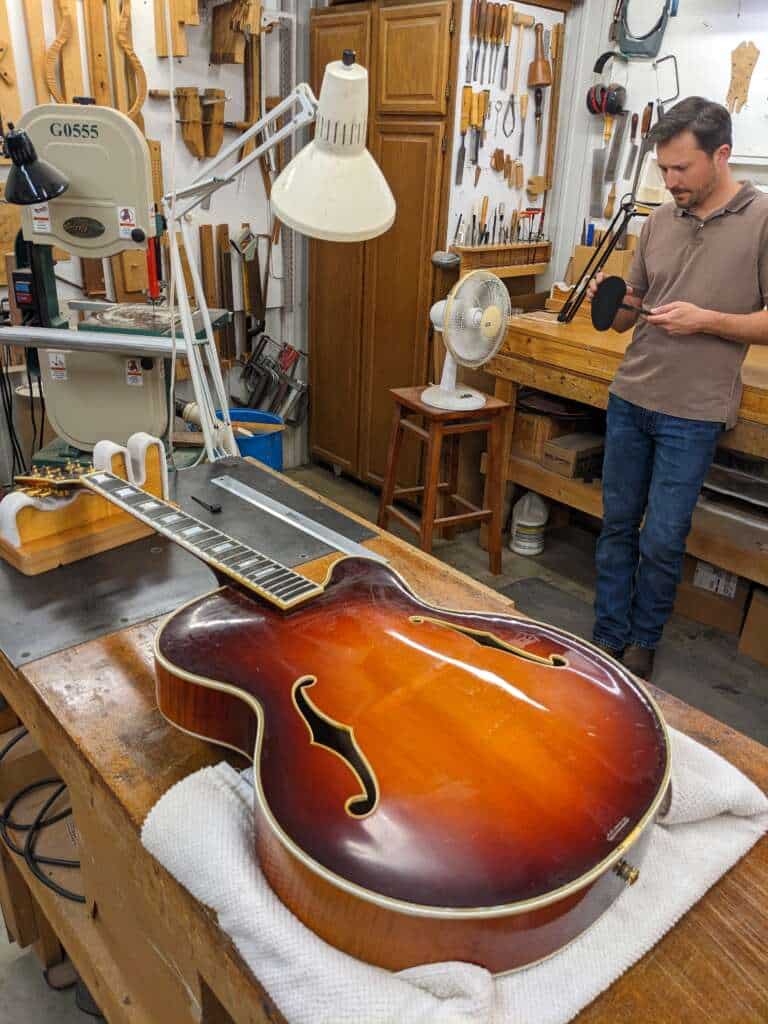 Jack Petersen's guitar on the bench