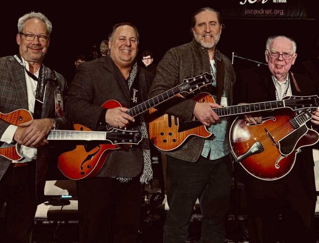 Barry Greene, Howard Paul, Corey Christiansen, and Jack Petersen with their Benedetto Guitars.