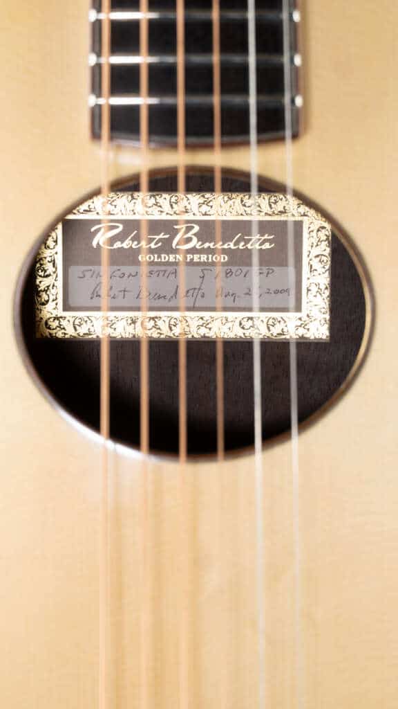 Close up of tag through soundhole